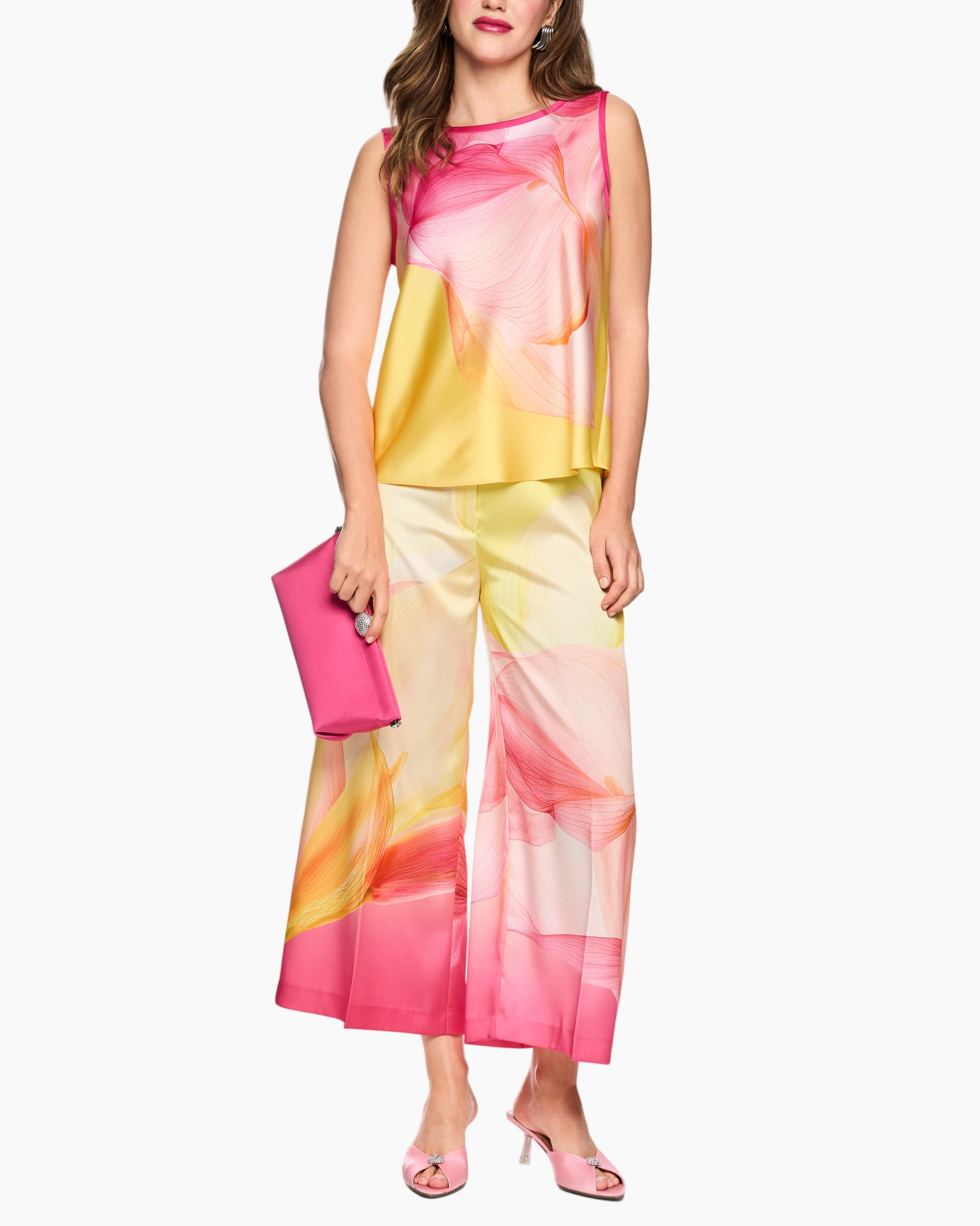 sleeveless top, wide-leg pants, colorful print, jumpsuit alternative, pink clutch