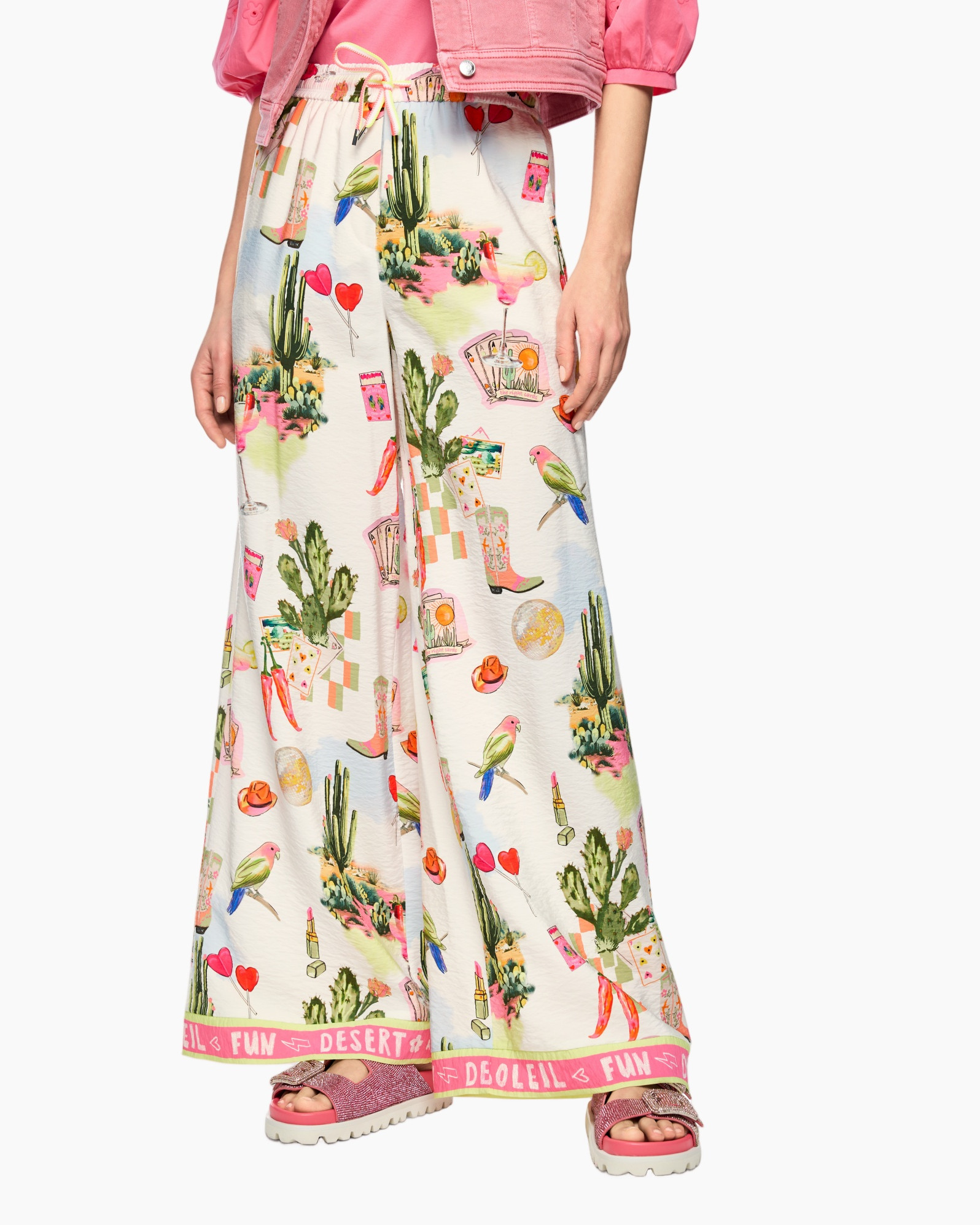 broek met brede pijpen, landschap print, woestijn motief, cactus patroon, roze zoom