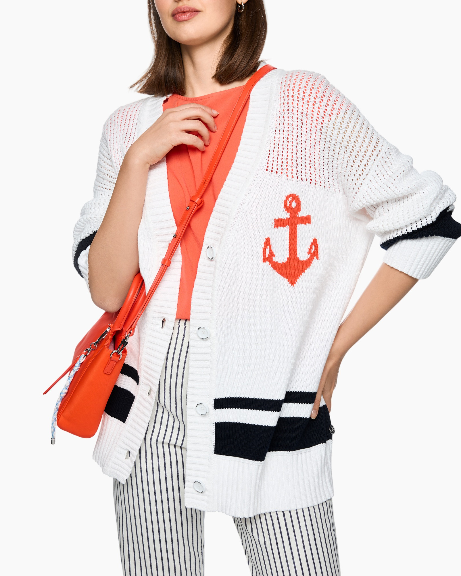 cardigan, anchor motif, white cardigan, orange bag, striped pants