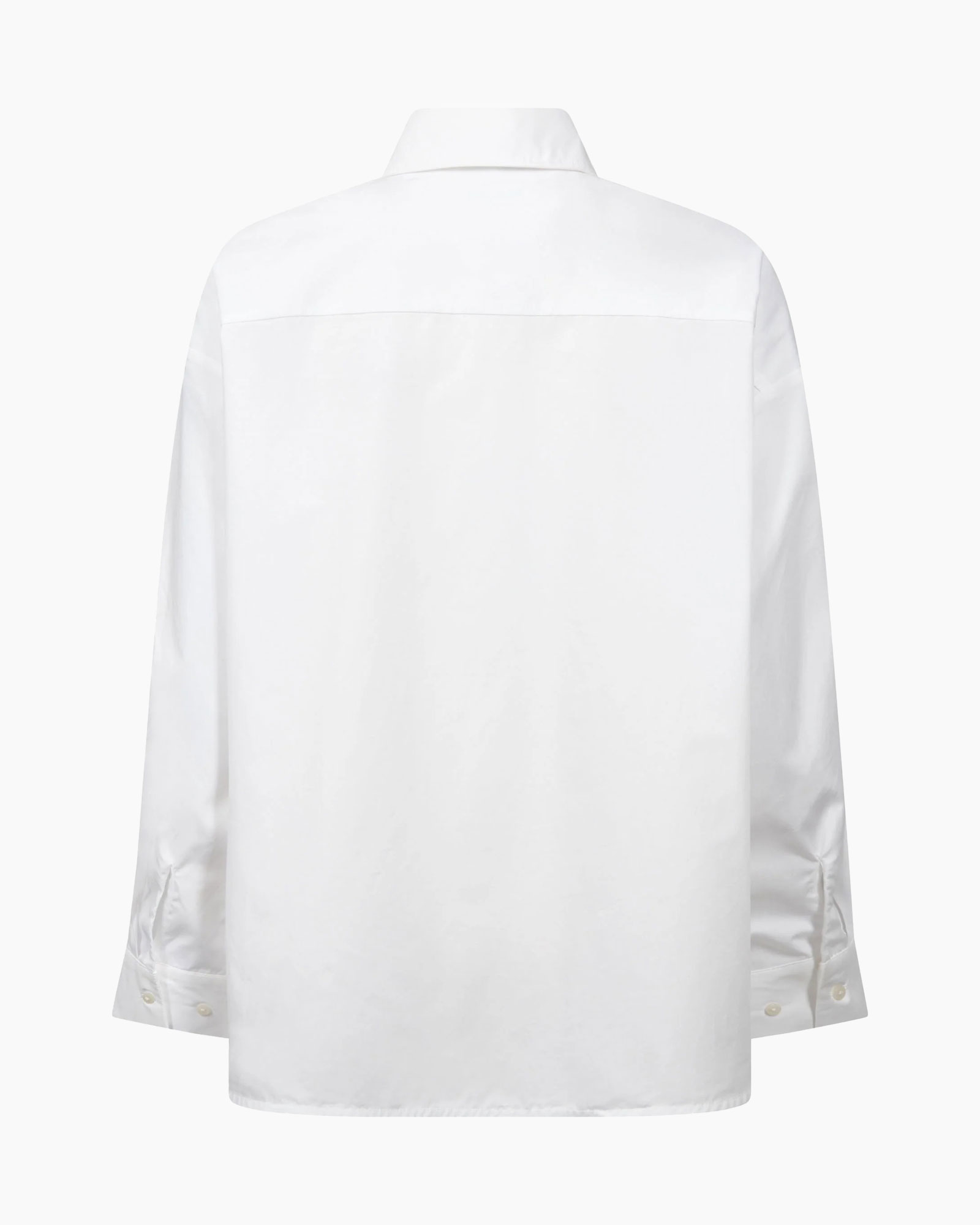 witte blouse, versierd, vetersdetail, knopen vooraan, lange mouwen