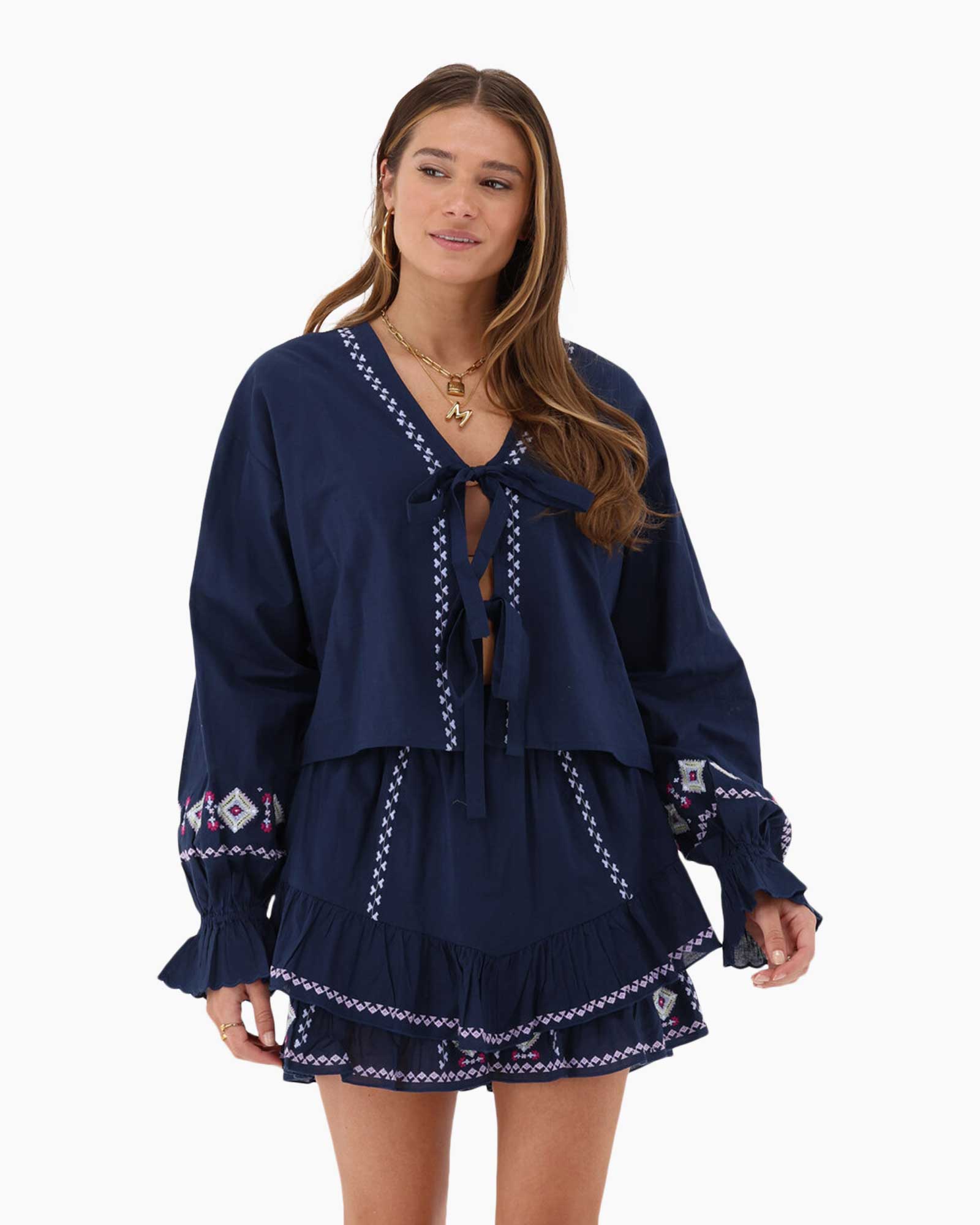 Top With Bows And Embroidery Blauw