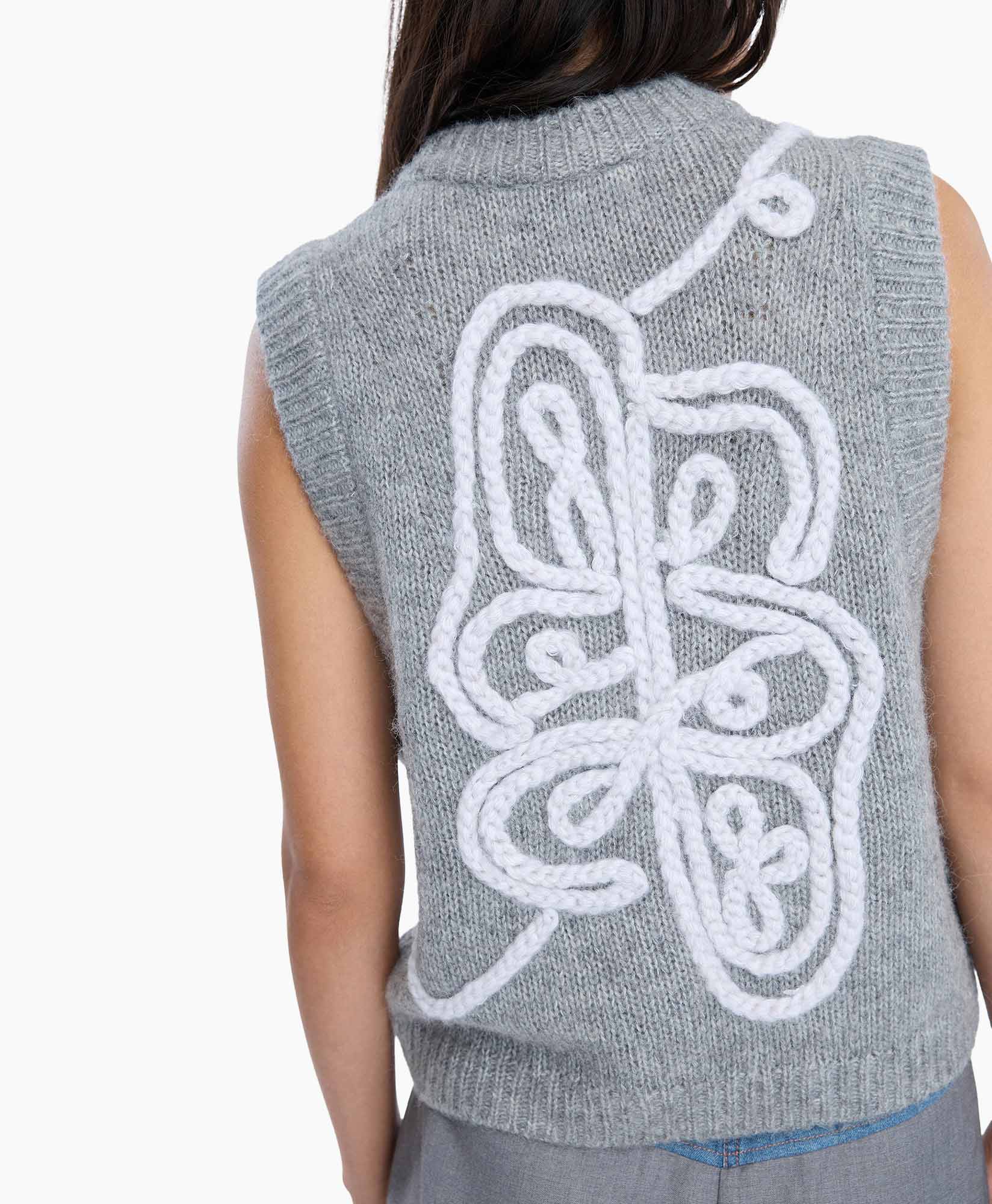knit vest, grey, sleeveless, v-neck, embellished pattern