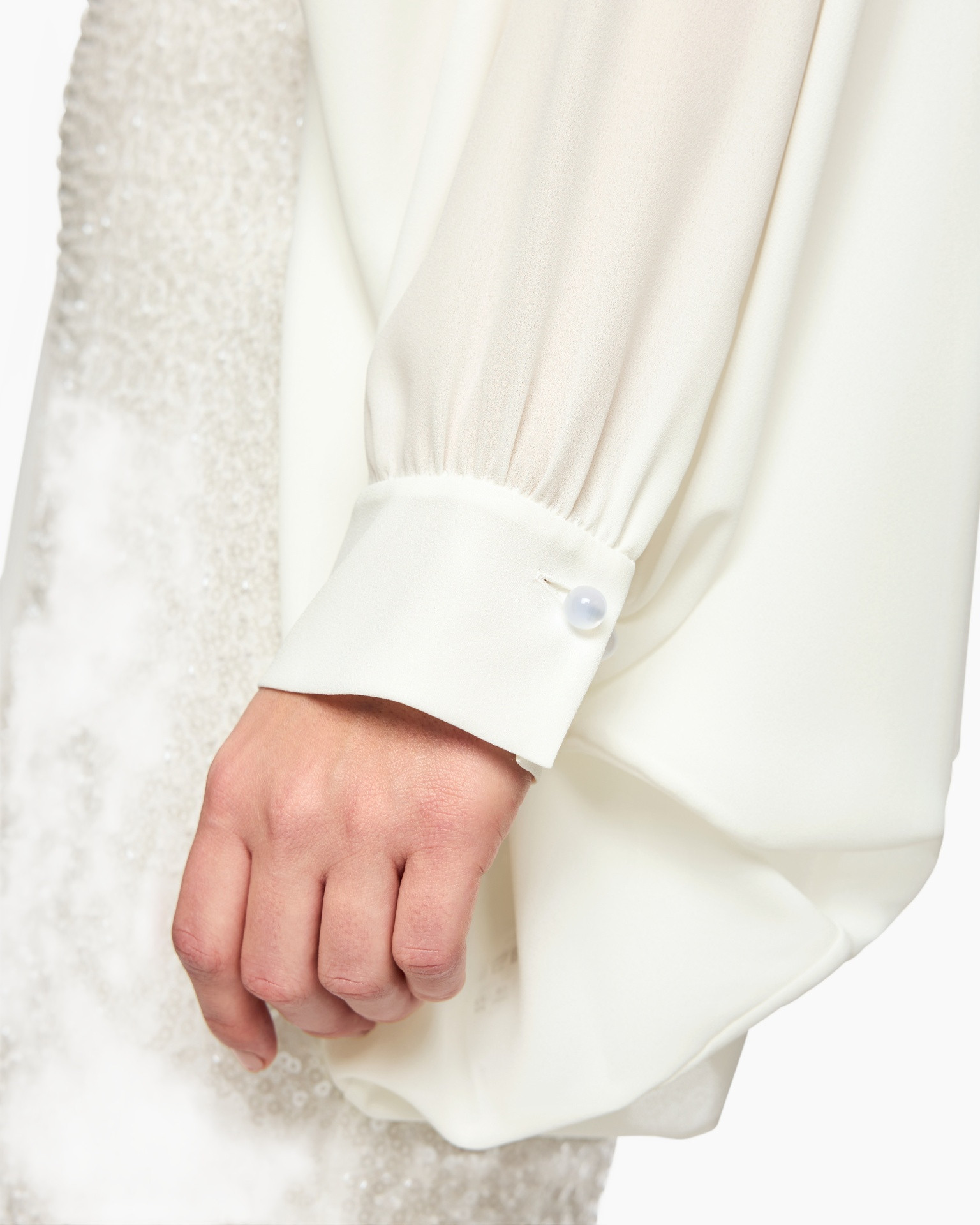 white, blouse, buttoned cuff, long sleeve, fabric texture