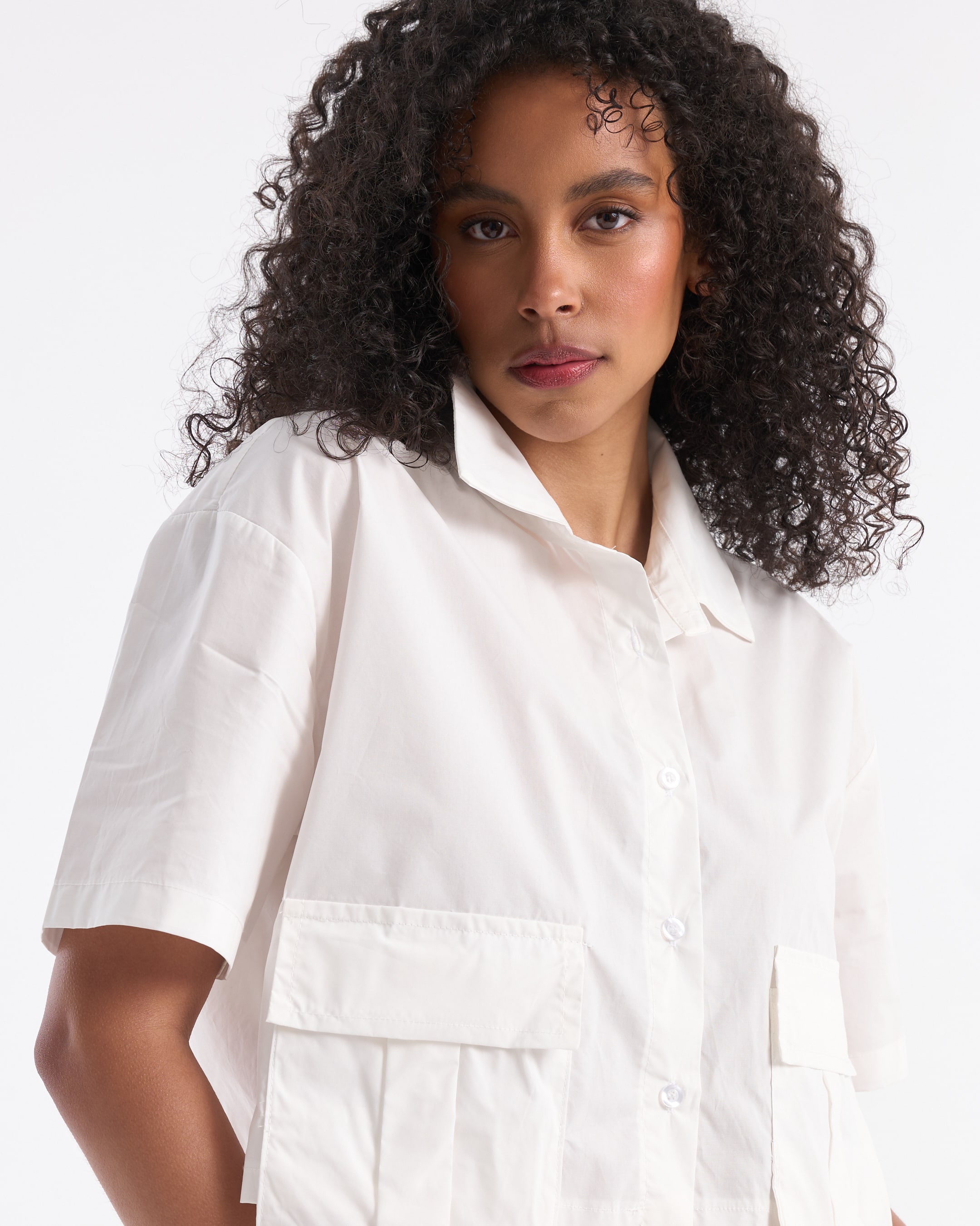 white shirt, short sleeves, collared shirt, front pockets, button-down