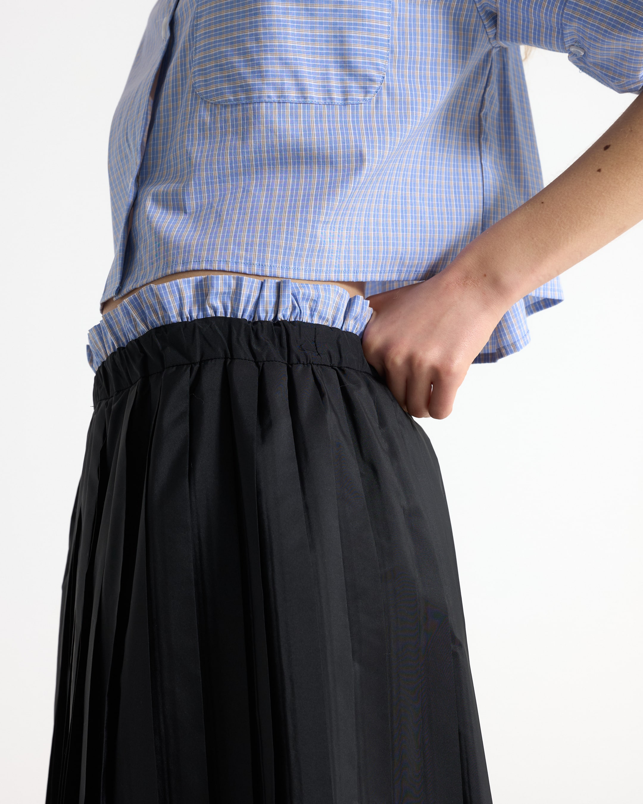 blue plaid shirt, elastic waistband, black skirt, pleated skirt, casual outfit