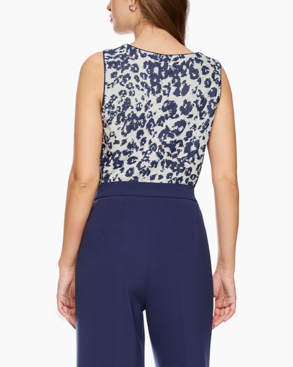 top, sleeveless, leopard print, blauw broek, hoge taille
