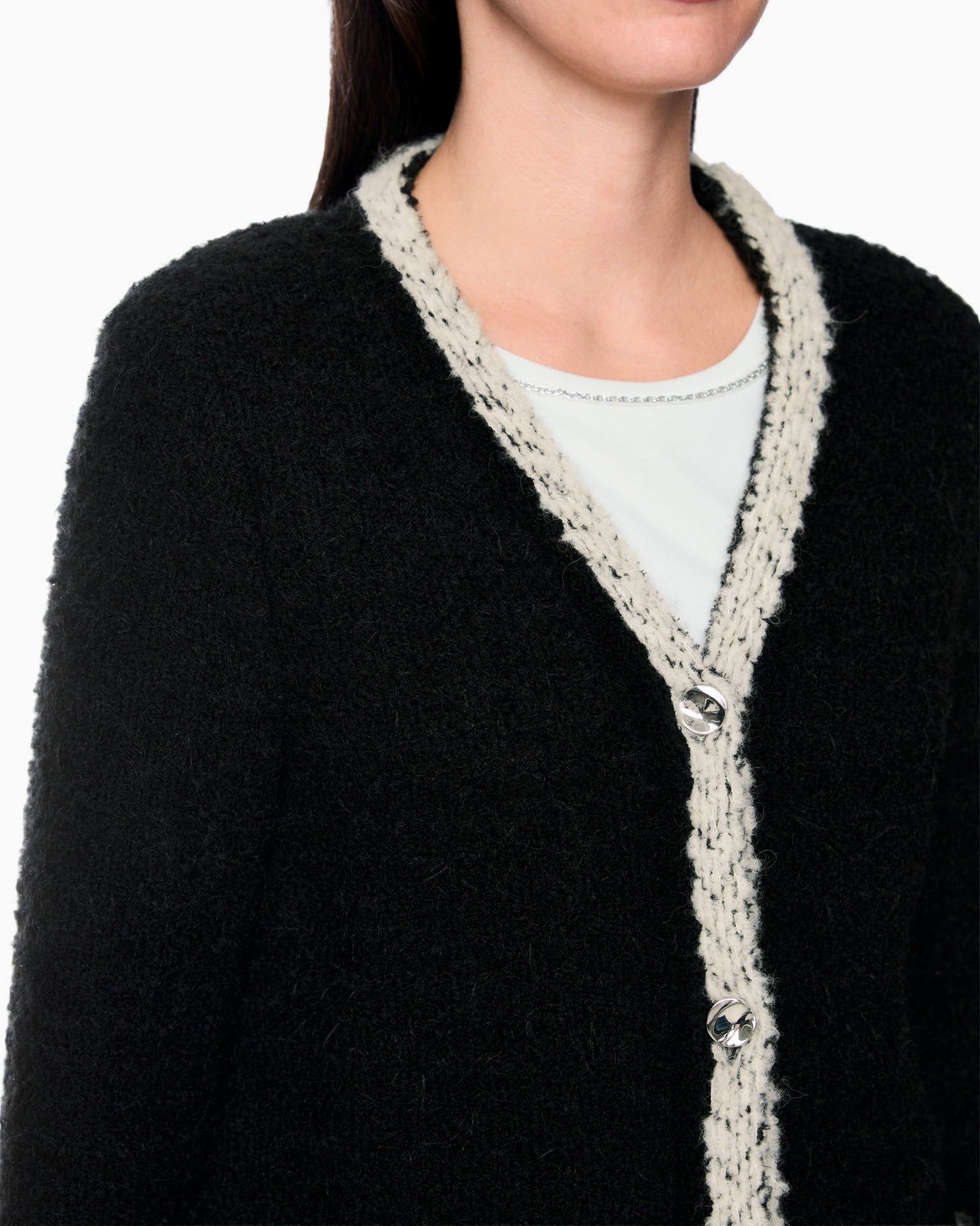 zwart vest, gebreide cardigan, contrast bies, knopen sluiting, rund hals