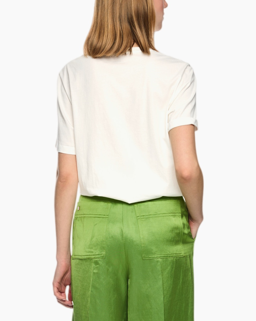 grafische blouse, luipaardprint, korte mouwen, witte shirt, printkunst