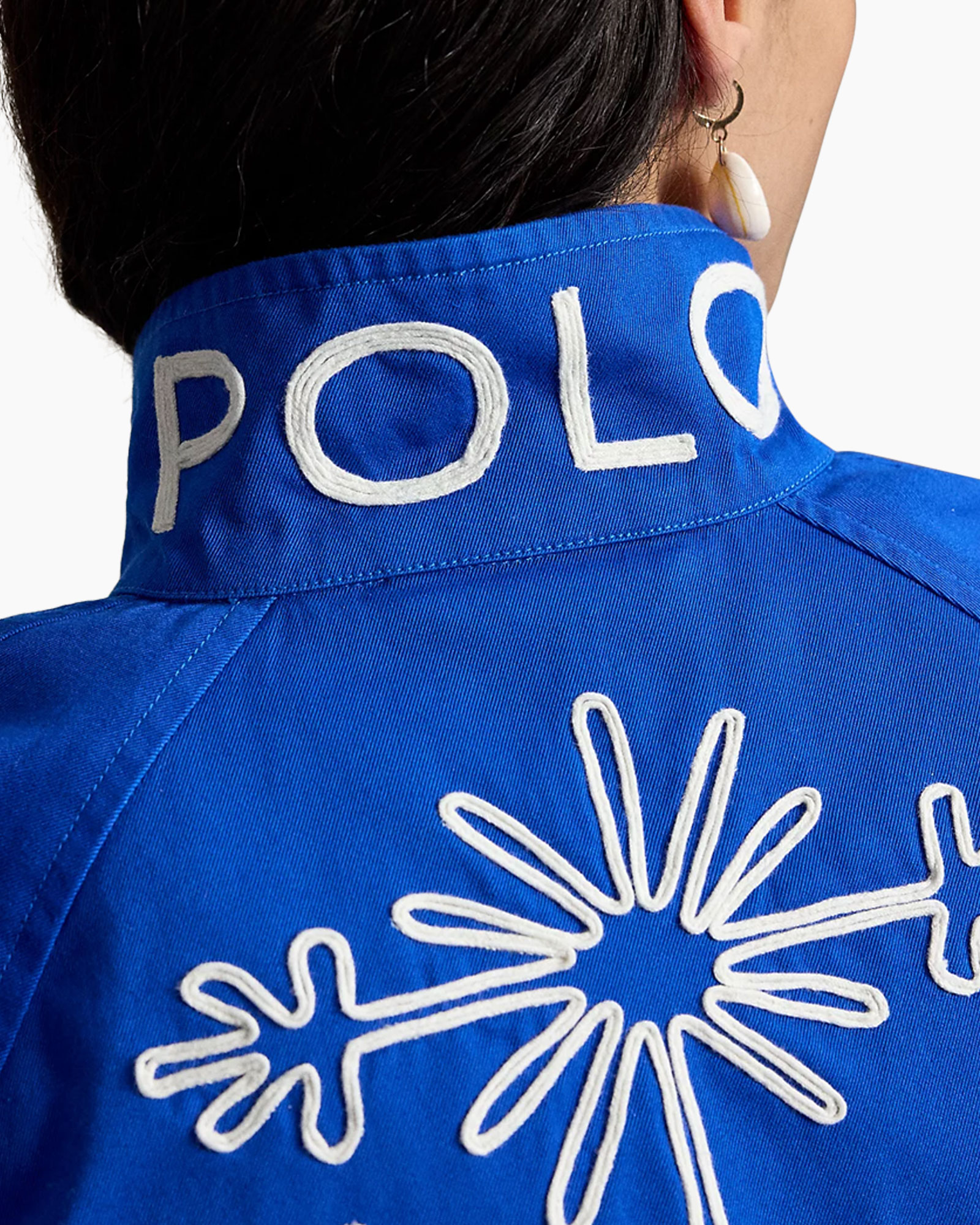 blaues jacke, stickerei, kraag/riem?, polo?, patroon?