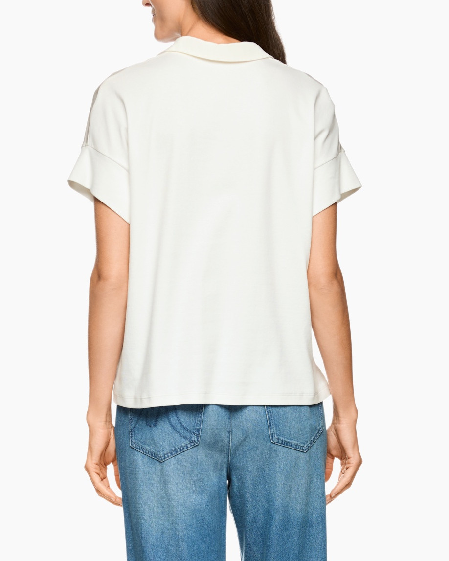 Blouse, Clothing, T-Shirt, Jeans, Person