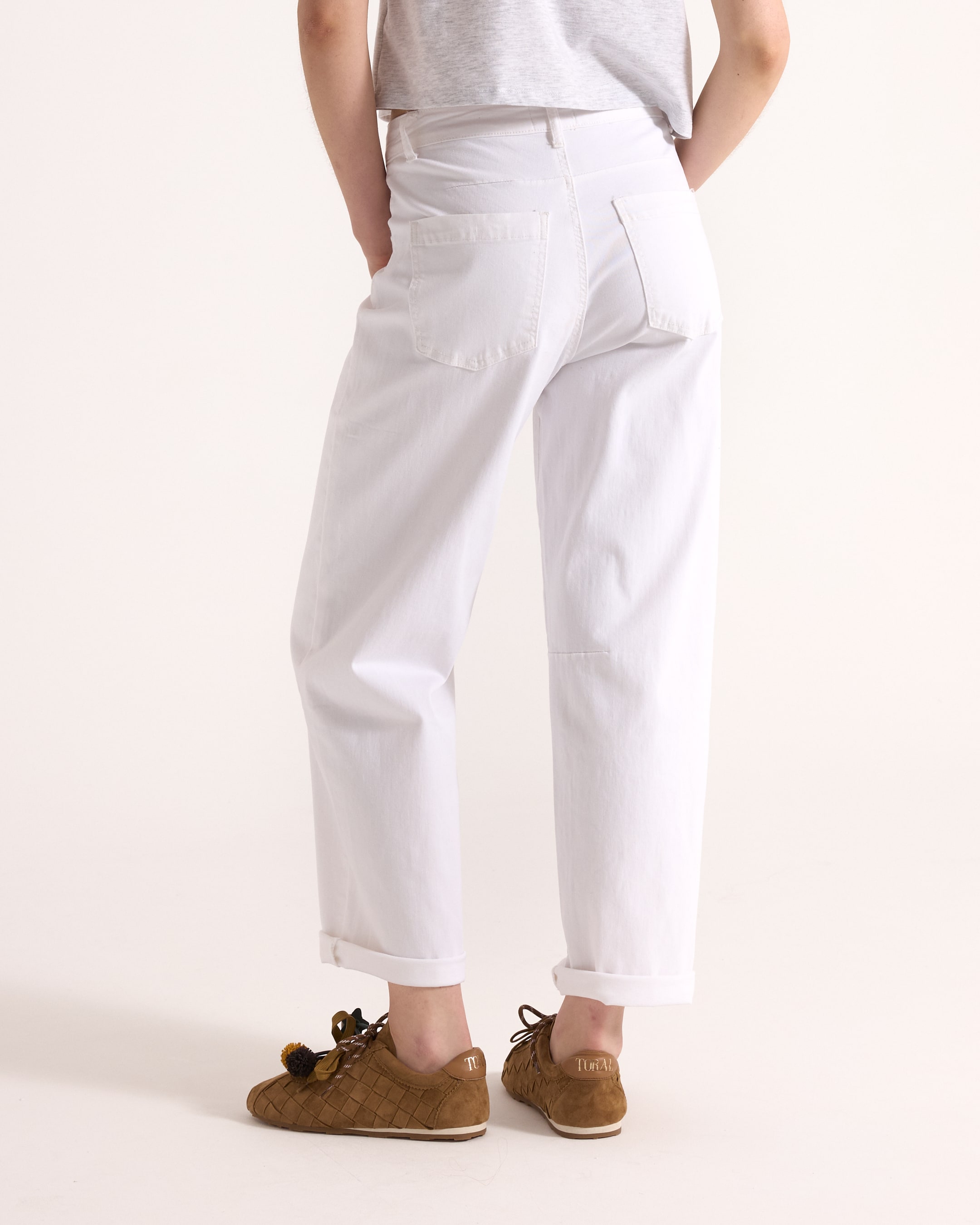 pants, white pants, cargo pants, back pockets, rolled cuffs