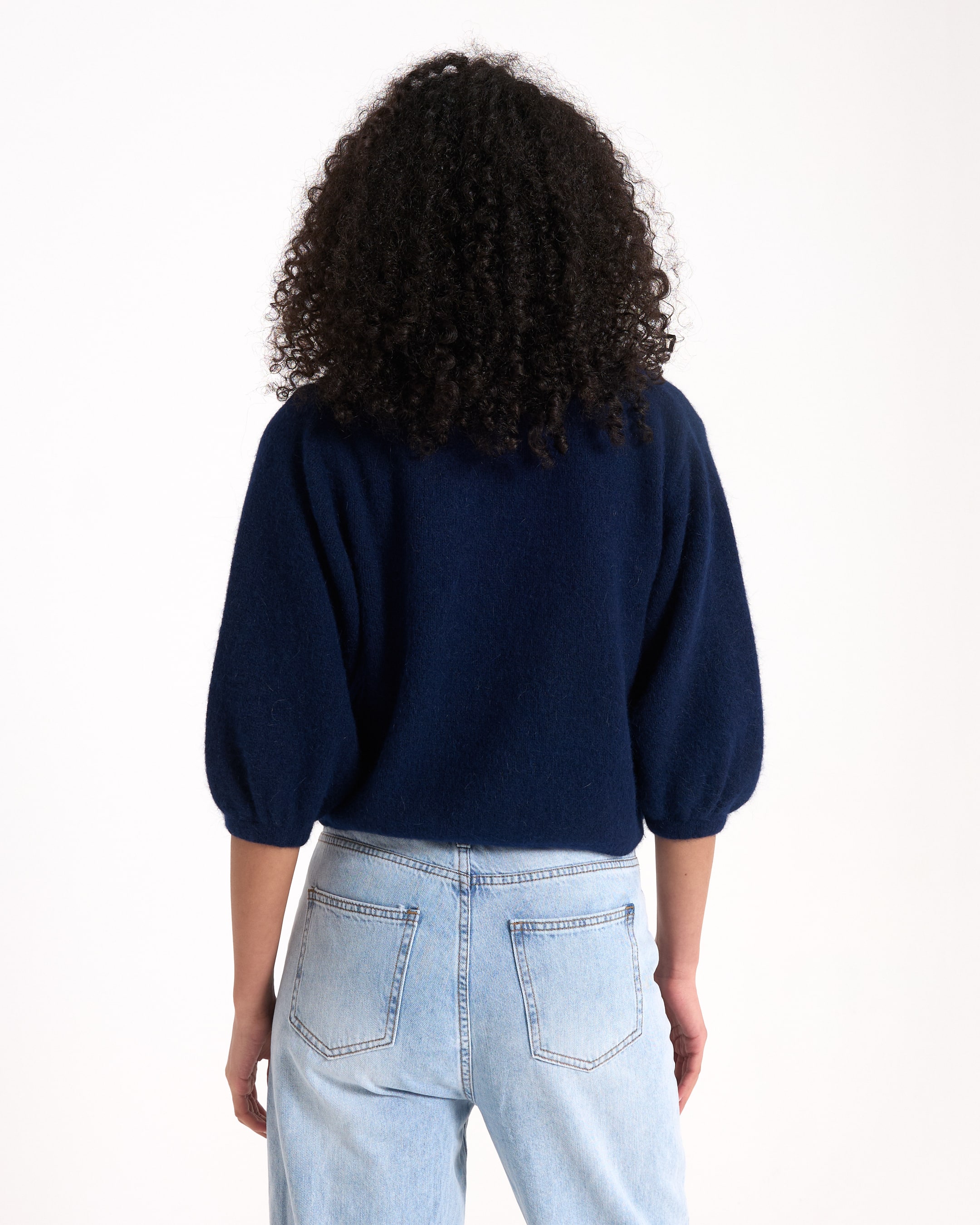 navy sweater, pullover, balloon sleeves, cropped length, denim jeans