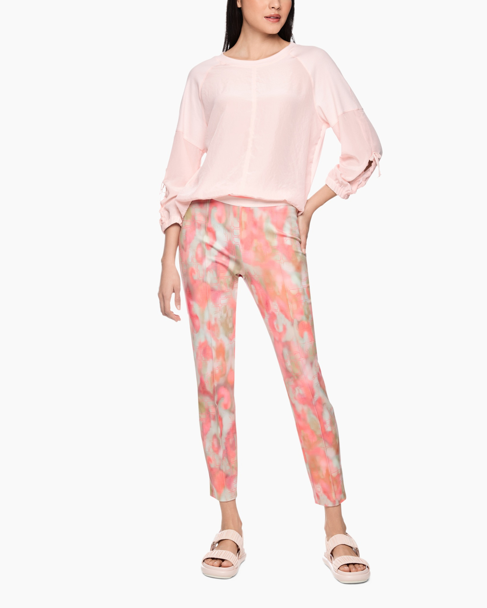 pink blouse, raglan sleeve, tie-dye pants, cropped sweatshirt, slip-on sandals