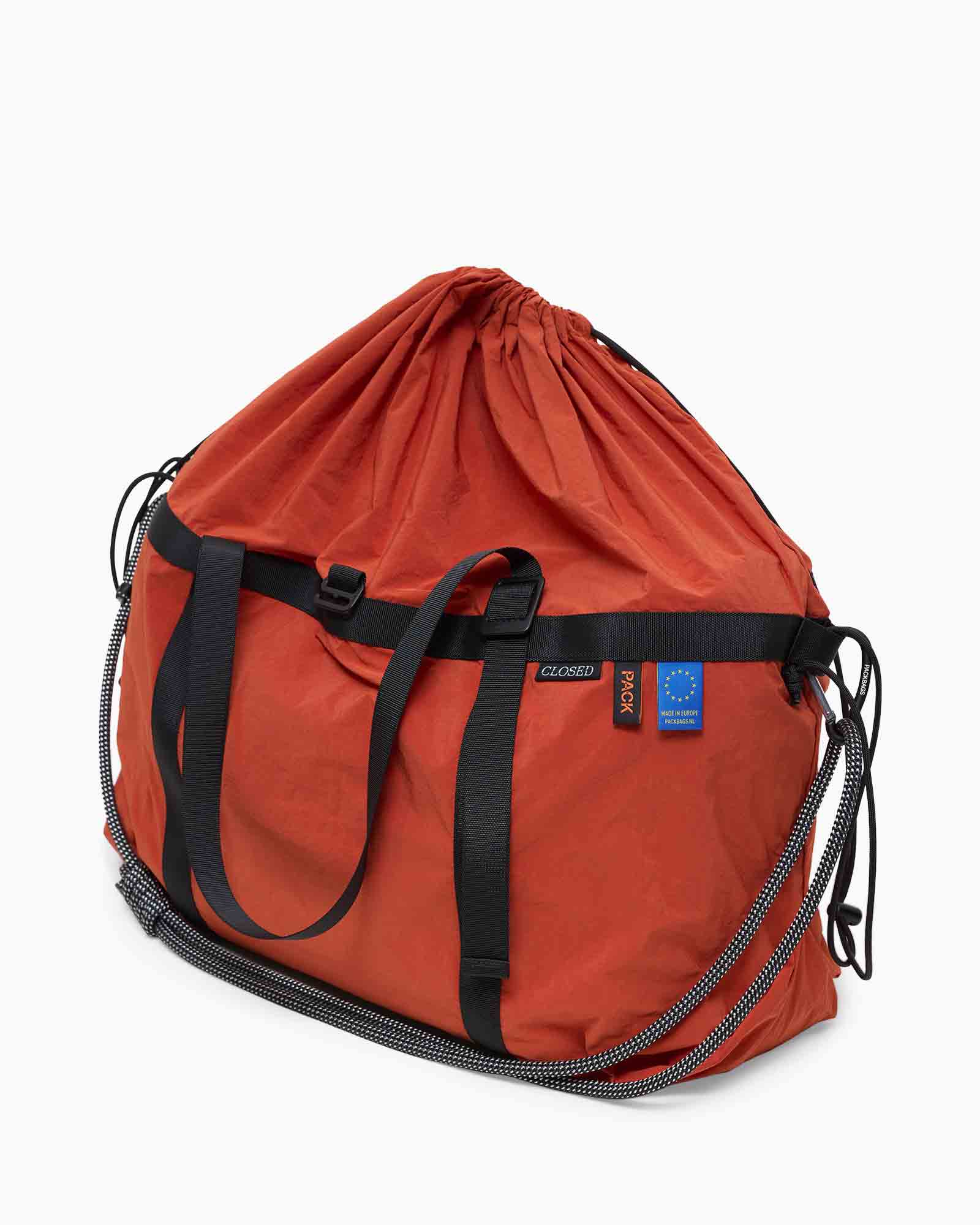 duffeltas, oranje tas, carryall, buitenzijde vakken, schouderriem