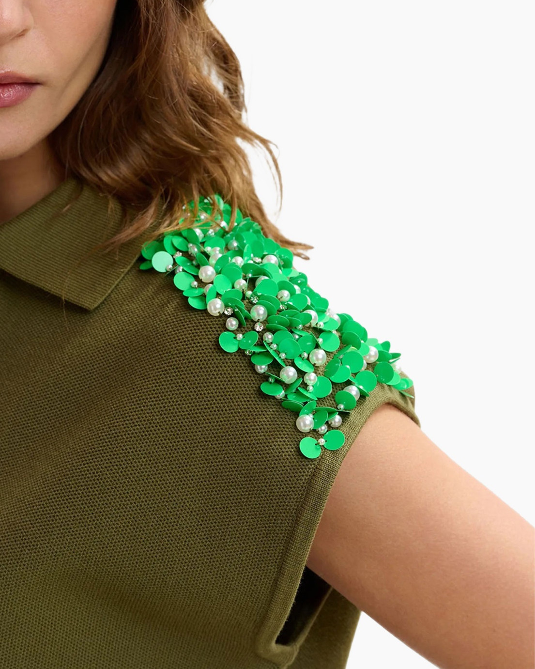 green embellishments, shoulder detail, polo knit, beaded decoration, pearl accents