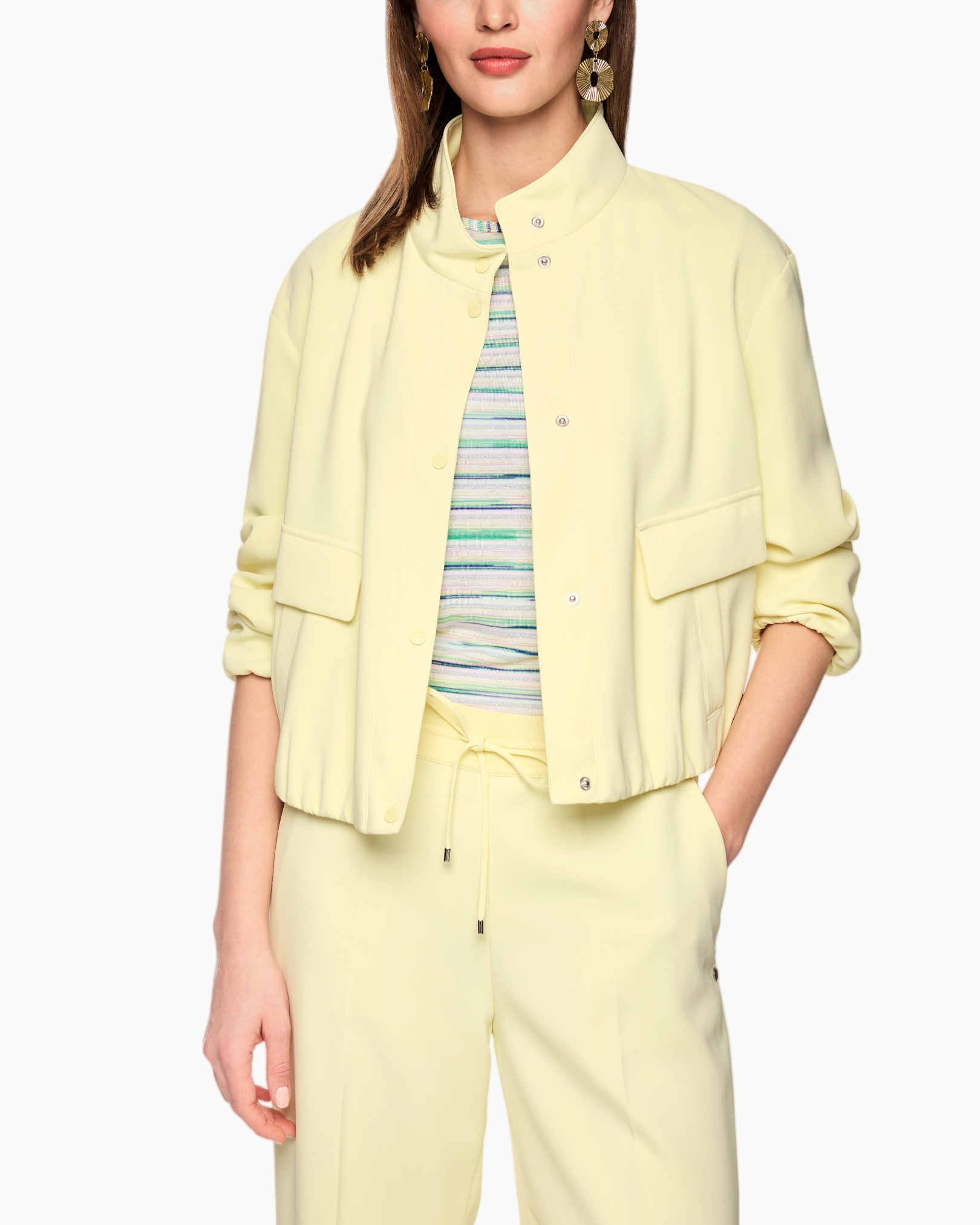 jacket, light yellow, collared, snap buttons, pockets