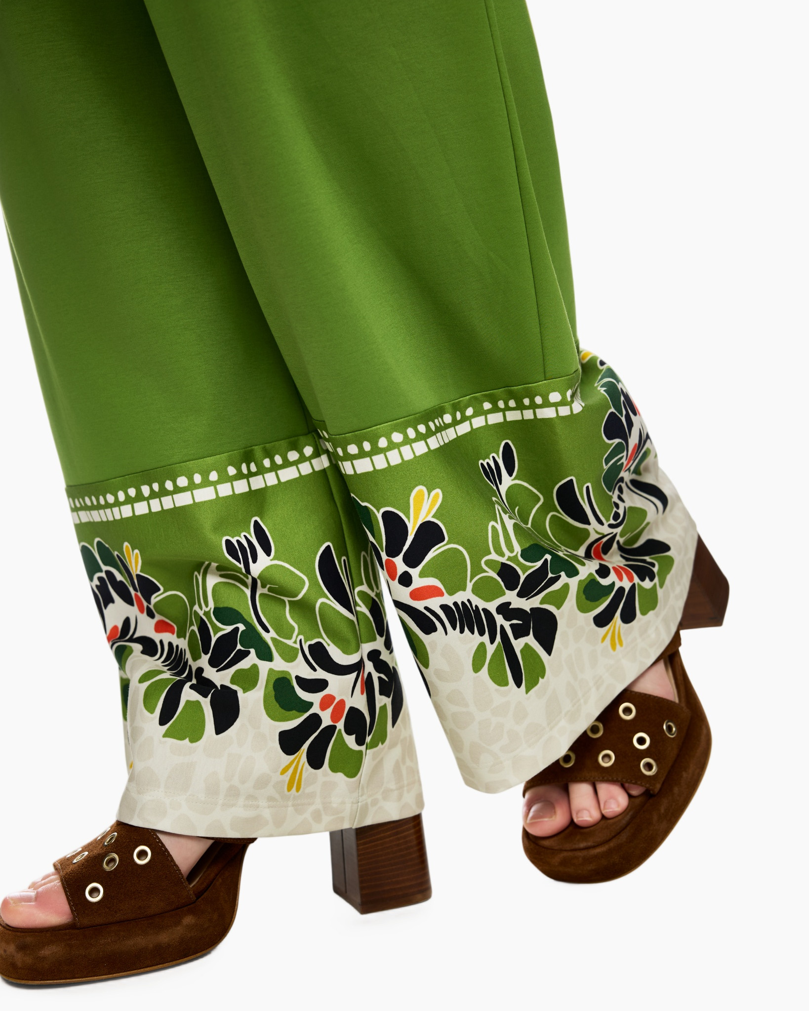 green pants, floral border, embroidered hem, wide leg, brown sandals