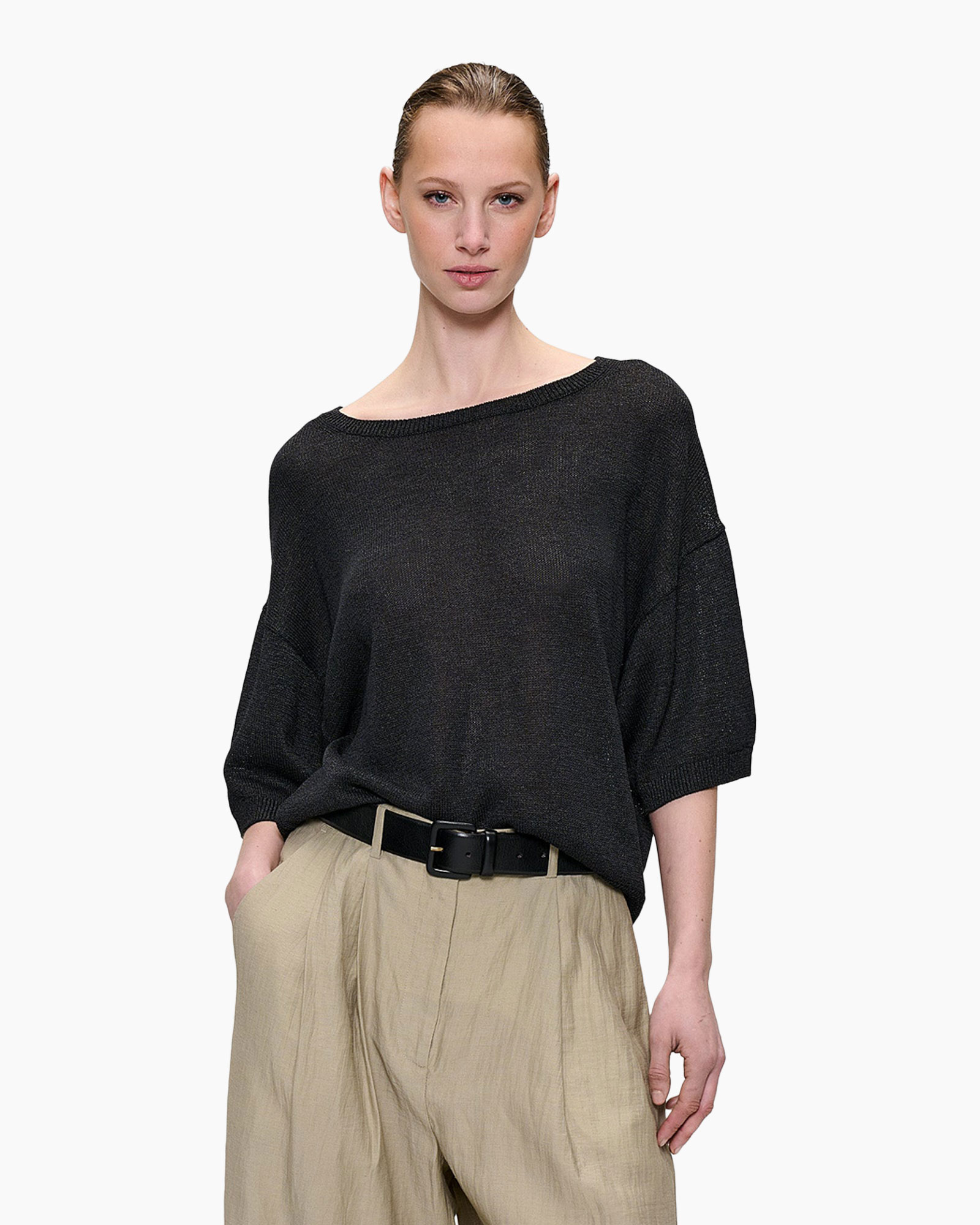 black knit top, loose fit, 3/4 sleeve, crew neck, beige trousers