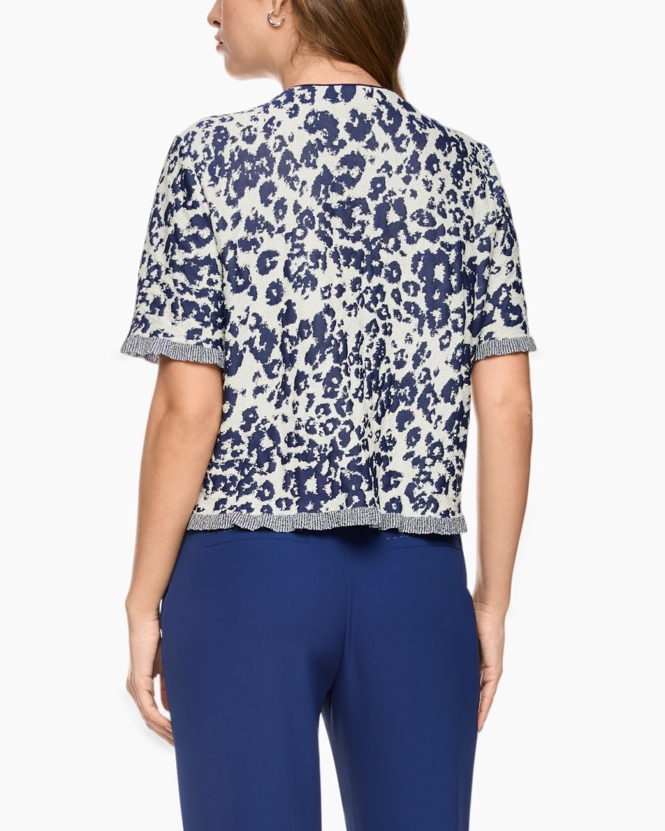 leeuw print, gebreide top, korte mouwen, vest, blauwe broek