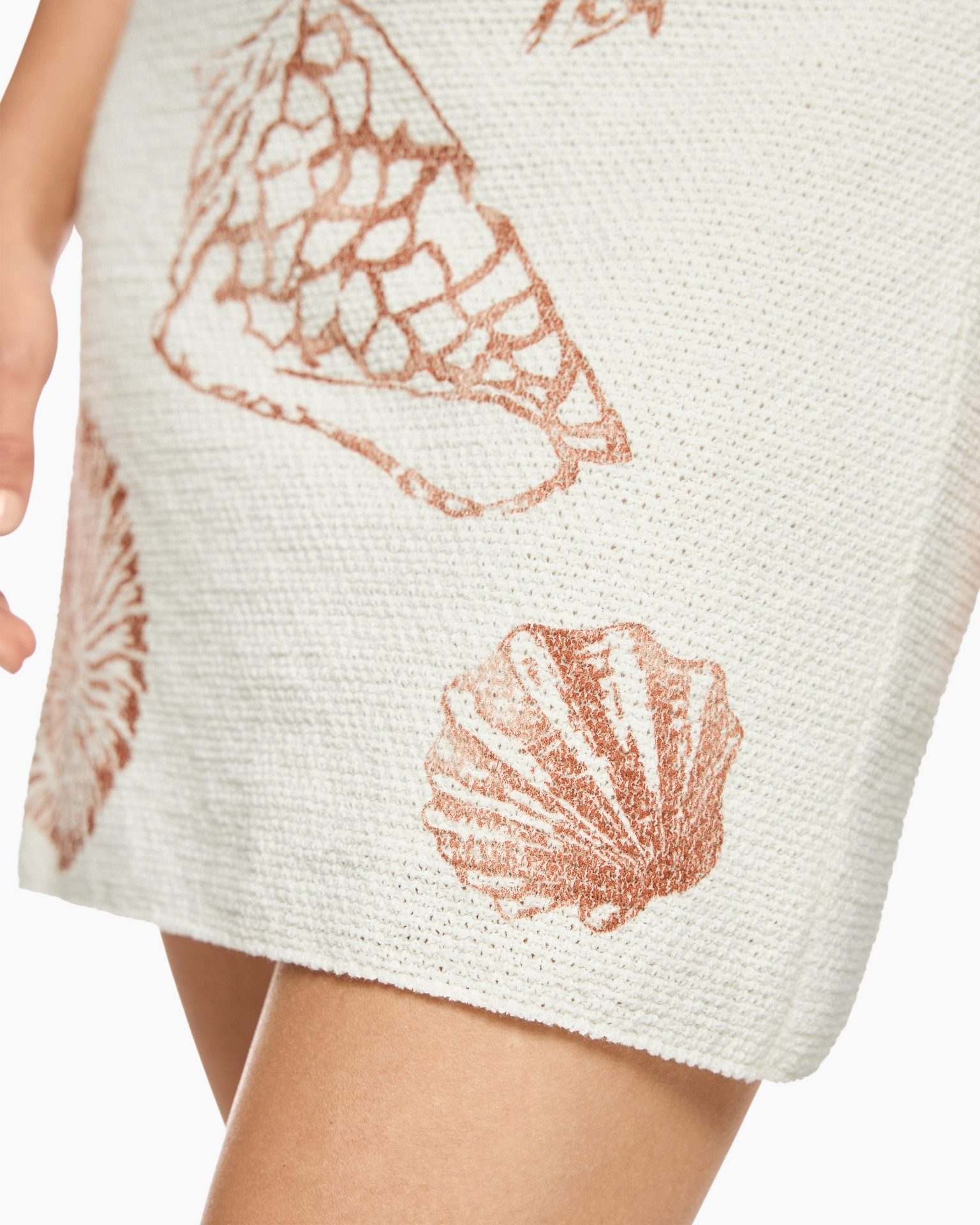beach, shell pattern, linen texture, cream knit, short skirt
