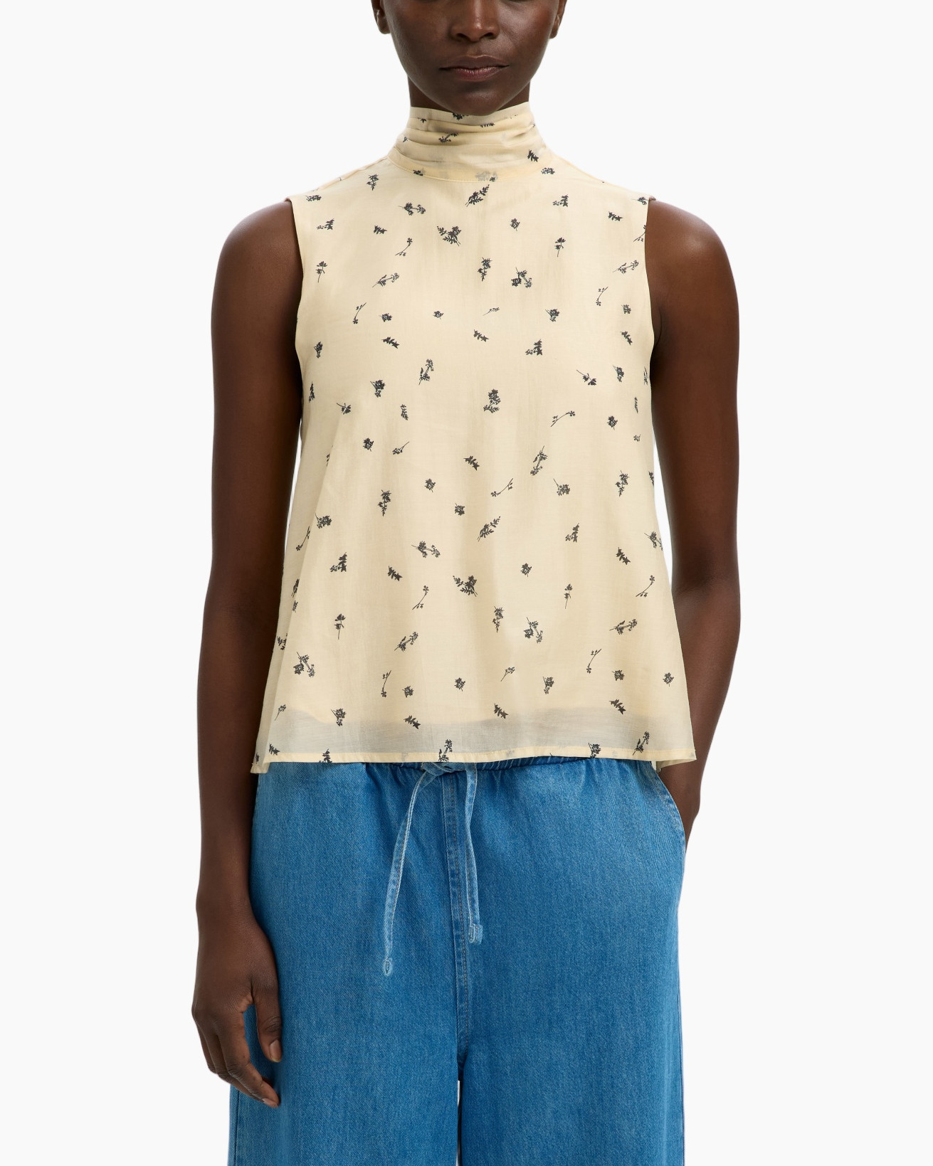 top body, hals-tank?, bloemprint?, zonder mouwen, beige
