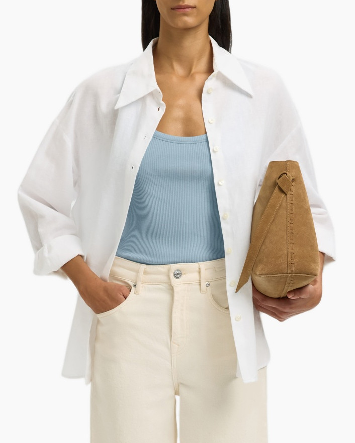 white shirt, oversize shirt, tan bag, blue top, beige pants