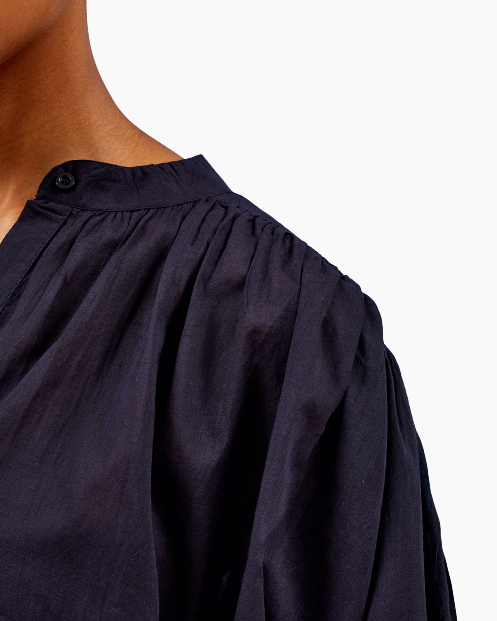 navy shirt, pleated sleeve, buttoned collar, linen-like fabric, dark blue