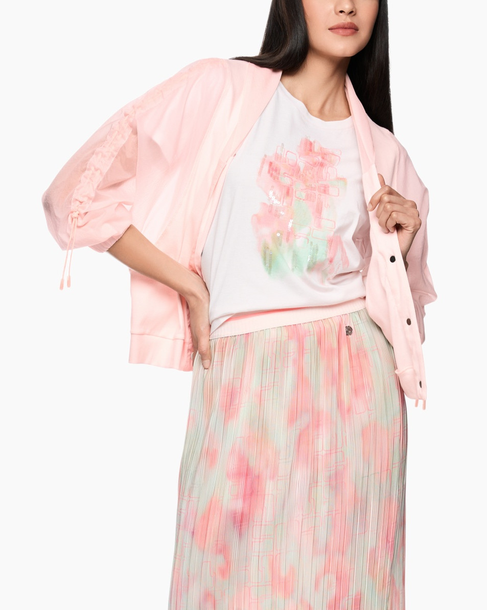 pink jacket, graphic tee, pastel colors, pleated skirt, casual outfit
