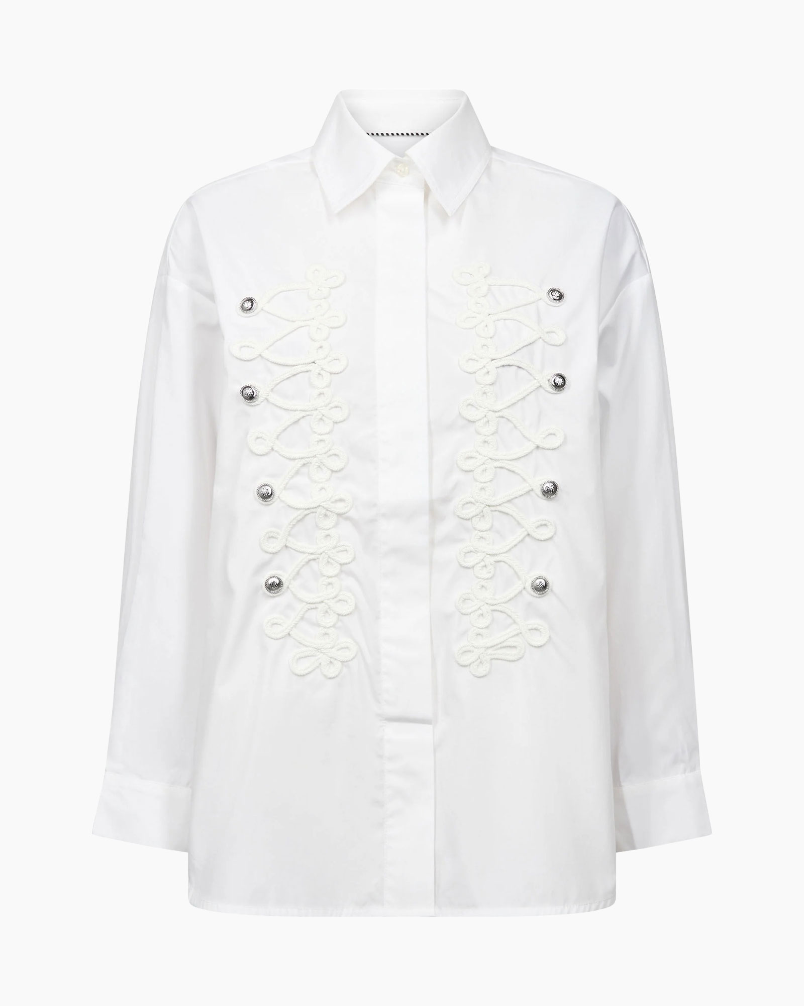 witte blouse, versierd, vetersdetail, knopen vooraan, lange mouwen
