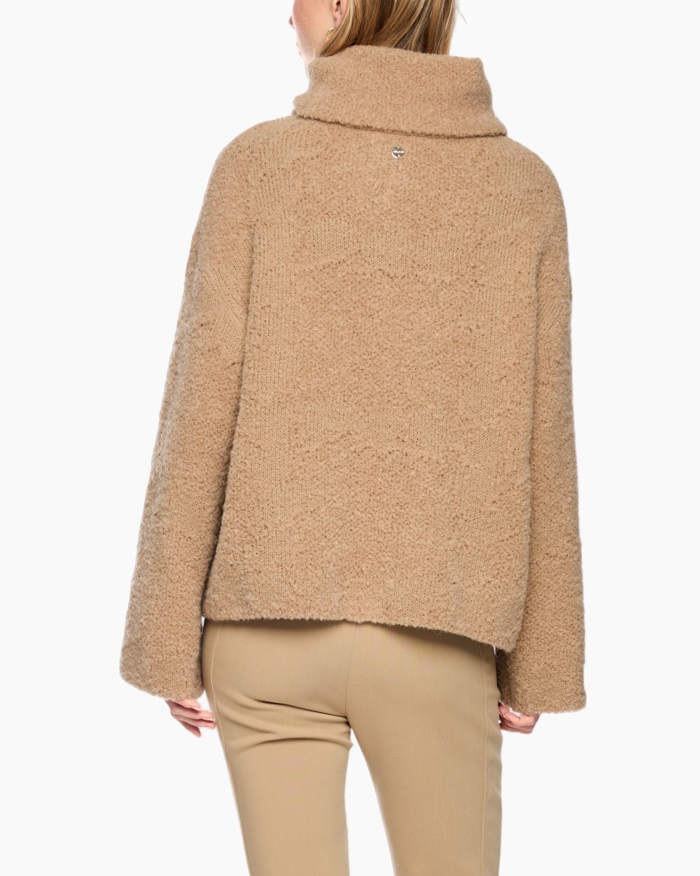 rolkraag, teddylike fleece, beige, trui, lossere mouwen