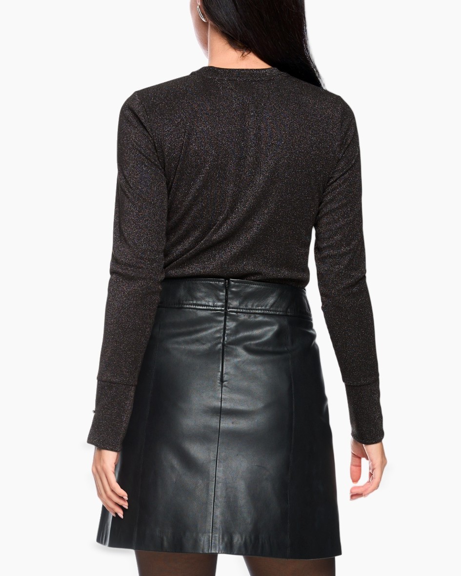 top, langer mouw, glitter, zwart, lederrokje