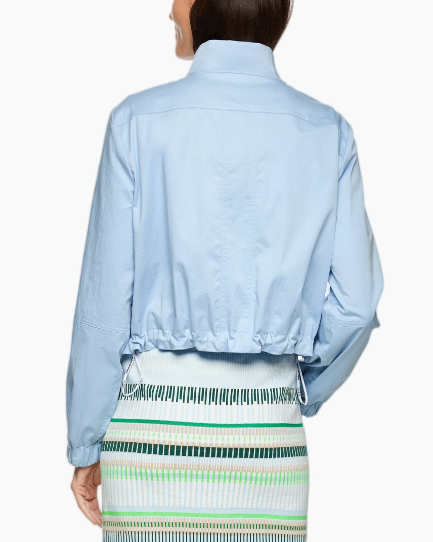 light-blue jacket, button-up jacket, collared jacket, pocketed jacket, rolled sleeve