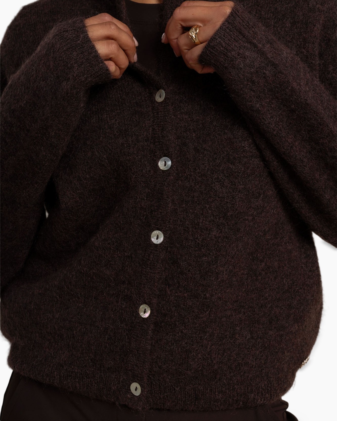 vests?, cardigan?, but tone must be nl