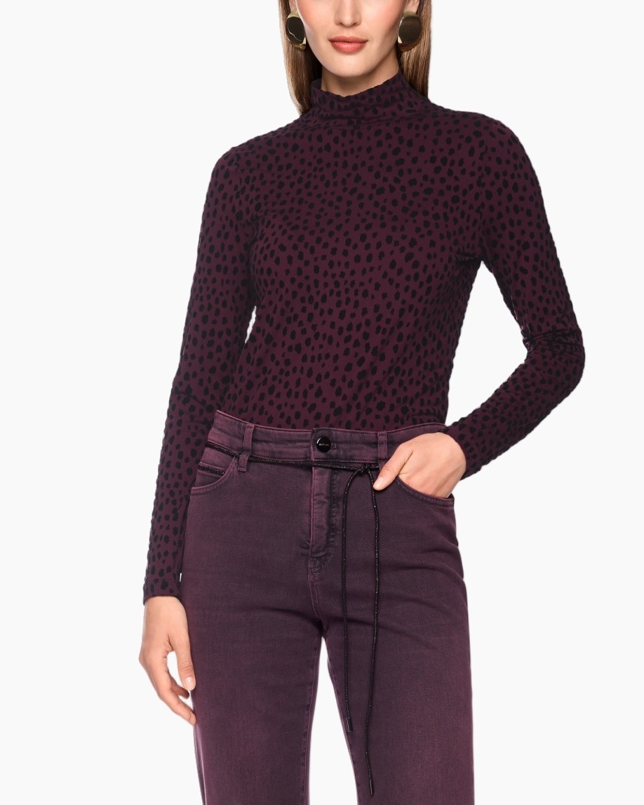 rolkraag, geprint top, leopard print, breiptrui, paarse jeans